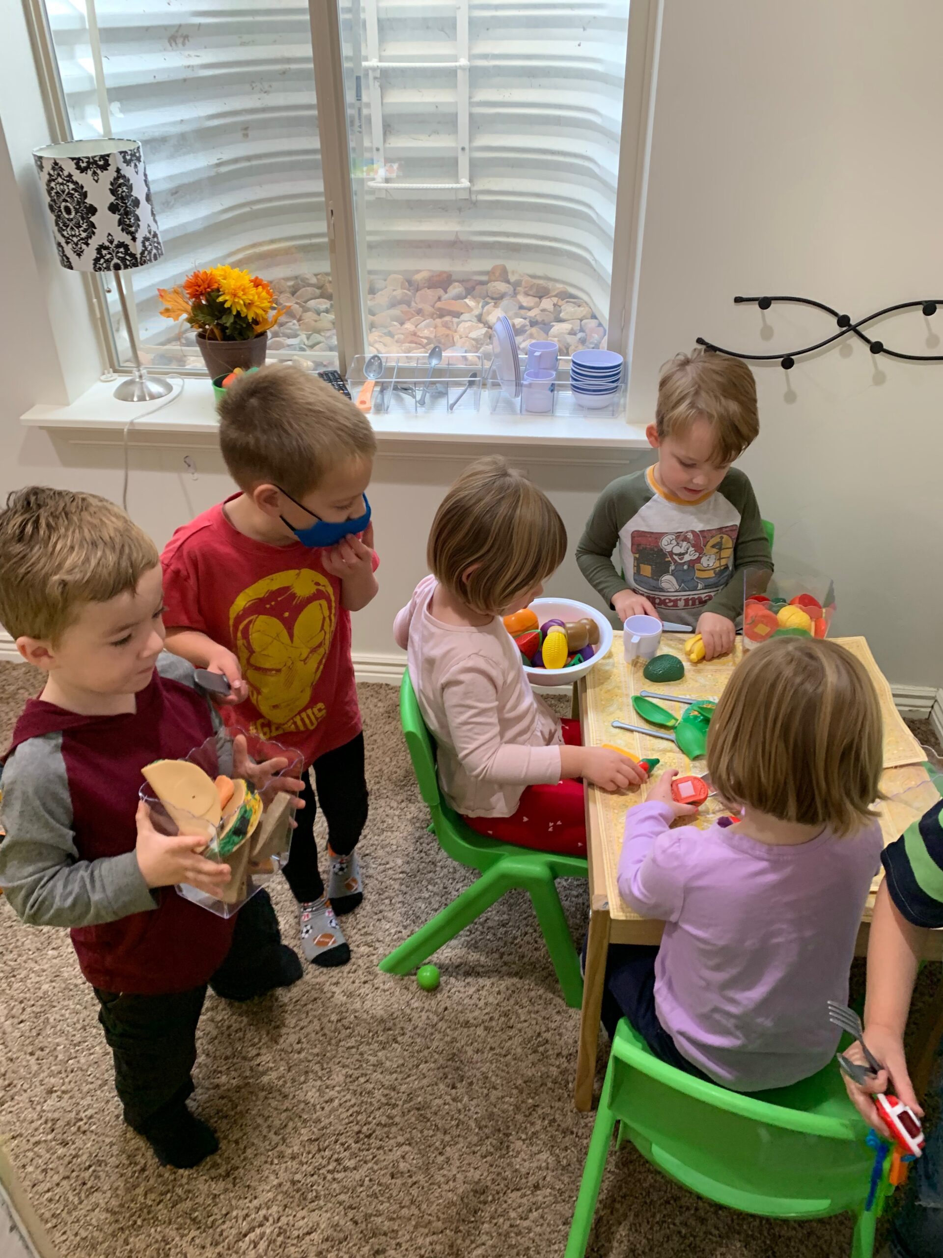 The Benefits of Pretend Play and How to Set Up a Dramatic Play Grocery